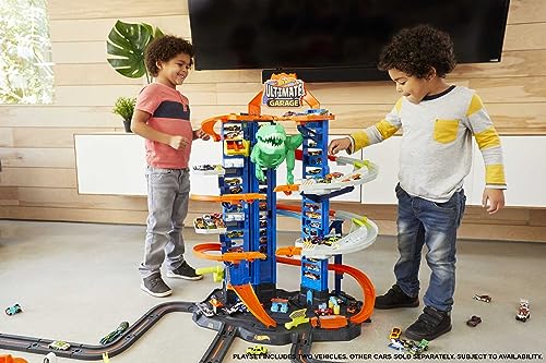 Hot Wheels City Robo T Rex Ultimate Garage Modalità multigiocatore a più livelli per riporre auto in scala 100 plus 1 64, idea regalo per bambini dai 5 anni in su, GJL14 : Giochi e giocattoli